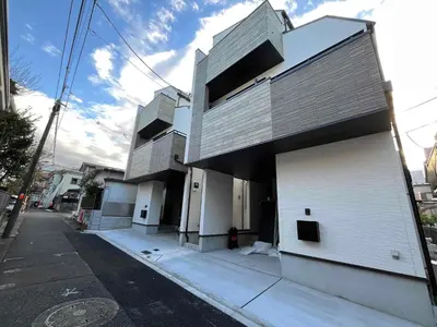 a building on the side of a street at Ochiai Open House in Tokyo