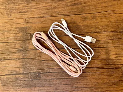a pink cord on a wooden table at Ikebukuro-Kanamecho Studio Comfortable&Central 2F in Tokyo
