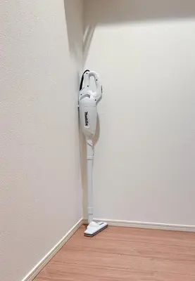 a white hair dryer in the corner of a room at \u6839\u5cb8\u6238\u5efa\u3066 in Tokyo