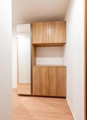 a room with a closet with wooden shelves at \u6839\u5cb8\u6238\u5efa\u3066 in Tokyo