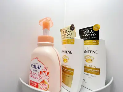 a bottle of cleaner and other products on a shelf at hananosato \u9ad8\u7530\u99ac\u5834 in Tokyo