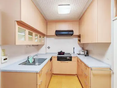 a small kitchen with a sink and a stove at hananosato \u9ad8\u7530\u99ac\u5834 in Tokyo
