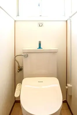 a bathroom with a white toilet in a room at Tokyo East Hotel in Tokyo