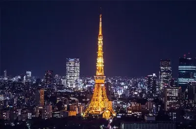 a view of the eiffel tower at night at SHIBUYA Bright Modern 40sqm Apartment FAMILY FRIENDLY!! in Tokyo