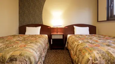 a hotel room with two beds next to each other at Tokyo Inn - Vacation STAY 26584v in Tokyo