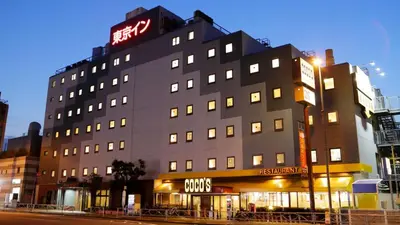 a building with a sign on top of it at Tokyo Inn - Vacation STAY 26569v in Tokyo