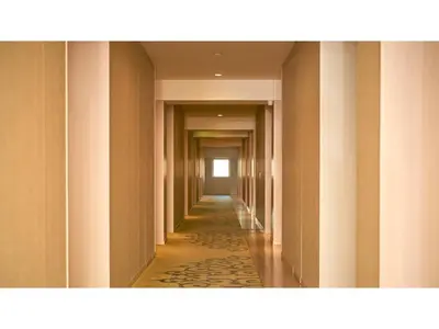 a corridor with columns and a long hallway at The OneFive Tokyo Kameido - Vacation STAY 64610v in Tokyo