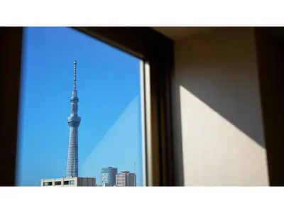 a view of the eiffel tower from a window at The OneFive Tokyo Kameido - Vacation STAY 64573v in Tokyo