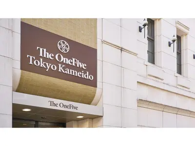 a building with a sign for the university of tokyo karmota at The OneFive Tokyo Kameido - Vacation STAY 64595v in Tokyo