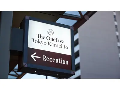 a sign for the outside tokyo kaminota reception at The OneFive Tokyo Kameido - Vacation STAY 64577v in Tokyo