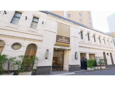 a white building with a sign on the front of it at The OneFive Tokyo Kameido - Vacation STAY 64577v in Tokyo