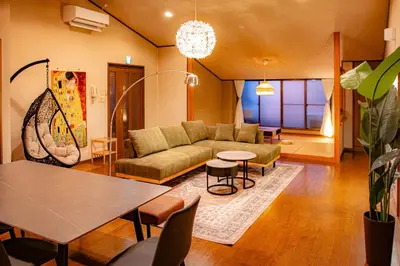 a living room with a couch and a table at Otsu Building - Vacation STAY 18729 in Tokyo