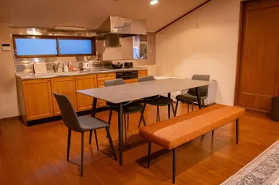 a kitchen with a table and chairs in it at Otsu Building - Vacation STAY 18729 in Tokyo