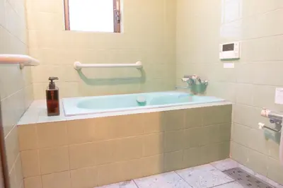 a bathroom with a bath tub in a room at Otsu Building - Vacation STAY 18729 in Tokyo