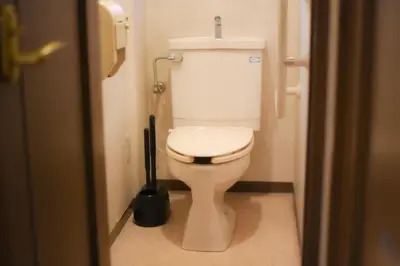 a bathroom with a white toilet in a stall at Otsu Building - Vacation STAY 18729 in Tokyo