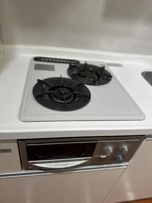 a white stove top oven with a burner on it at SHIBUYA Room in Tokyo