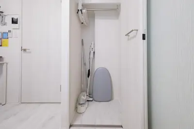 a bathroom with a white toilet in a room at Sumire in Tokyo