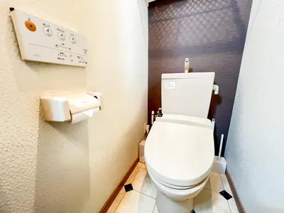 a bathroom with a white toilet in a stall at Otsuka 2 double beds Apt, Free Wi-Fi in Tokyo