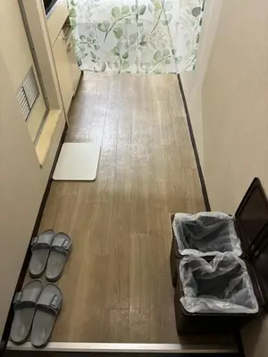 a pair of sandals sitting on the floor in a room at ksmst in Tokyo