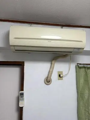 a light hanging from the ceiling of a room at ksmst in Tokyo