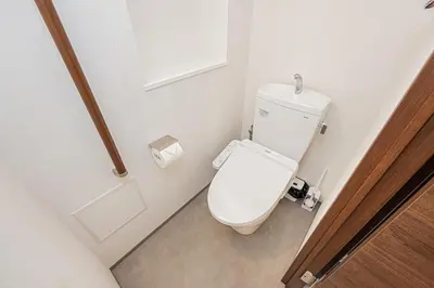 a bathroom with a white toilet in a room at Japan House \u5fa1\u5f92\u753a in Tokyo