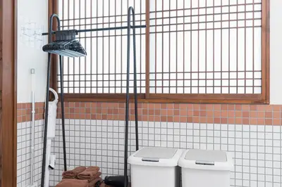 a bathroom with a toilet and a cage at Residence Akasaka Comfort in Tokyo