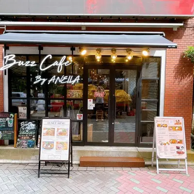 a restaurant with two signs in front of a store at Residence Akasaka Comfort in Tokyo