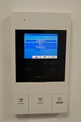 a flat screen tv sitting on top of boxes at \u4e1c\u4eac\u6c11\u5bbf \u5fa1\u7e01\u5bbf in Tokyo