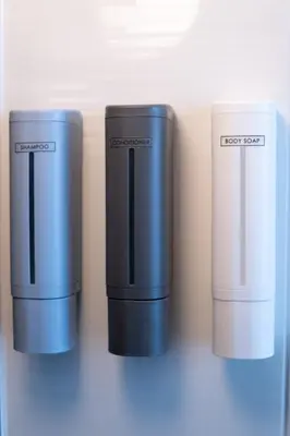 three printers are lined up on a shelf at \u4e1c\u4eac\u6c11\u5bbf \u5fa1\u7e01\u5bbf in Tokyo