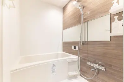 a bathroom with a shower and a sink at Asakusa Miyabi no mori in Tokyo