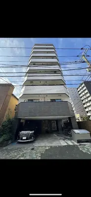 a tall building with a car parked in front of it at CAlMU ASAKUSA IMADO HOTEL ASAKUSA UENO IMADOZINZYA TOKYOSKYTREE HANEDA NARITA GINZA TOKYOSTATION Direct \u6d45\u8349\u4e0a\u91ce\u6771\u4eac\u30b9\u30ab\u30a4\u30c4\u30ea\u30fc \u6210\u7530\u7a7a\u6e2f\u7fbd\u7530\u7a7a\u6e2f\u6771\u4eac\u99c5\u76f4\u884c\u30d0\u30b9\u96fb\u8eca\u4fbf\u5229 in Tokyo