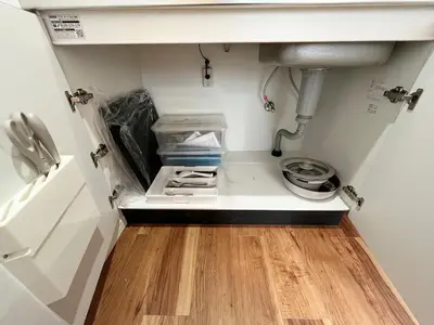a kitchen with a sink under a counter at jtr\u6d45\u8349\u6a4b301 in Tokyo