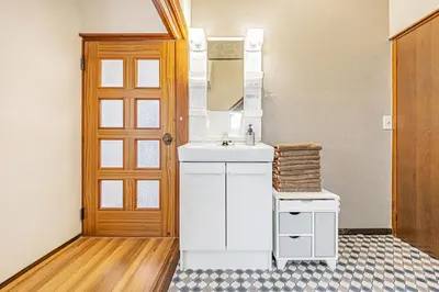 a bathroom with a sink and a mirror at ODYSSEY Tokyo Skytree in Tokyo