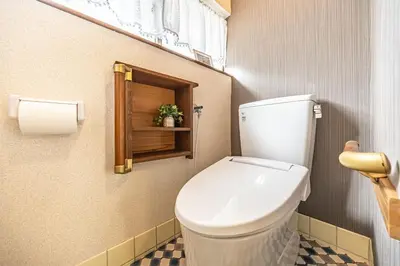 a bathroom with a white toilet in a room at ODYSSEY Tokyo Skytree in Tokyo