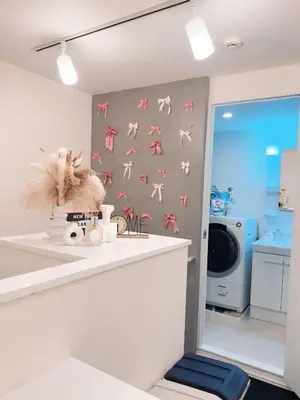 a bathroom with a wall with flamingos on it at Ueno Rose in Tokyo