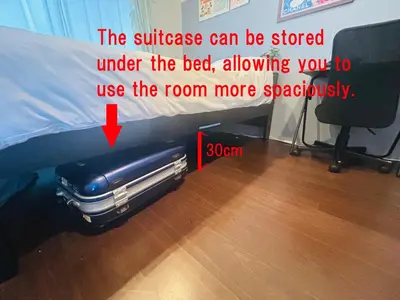 a suitcase under a bed in a room at Shibuya Station 8-min walk, Shibuya Center, 3 people stay, WIFI, 4F No elevetor in Tokyo