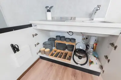 a bathroom with a sink under a sink at \u3077\u3075\u304b\u30b7\u30bf\u30e4\u516b\u5e83 in Tokyo