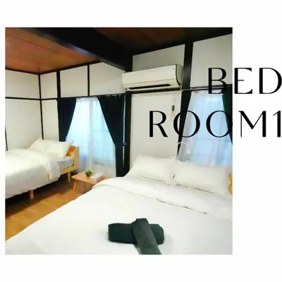 a bedroom with two beds with white sheets at Full facilities 9PPL CozyHouse1 stop-Yamanote Line in Tokyo