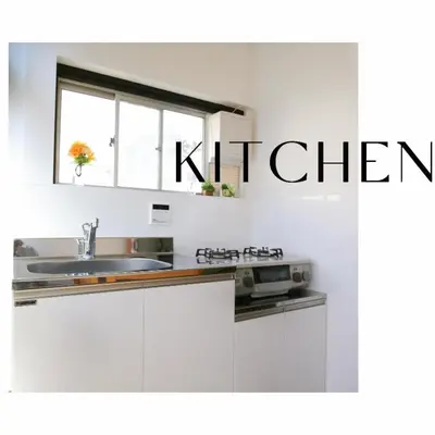 a white kitchen with a sink and a window at Full facilities 9PPL CozyHouse1 stop-Yamanote Line in Tokyo