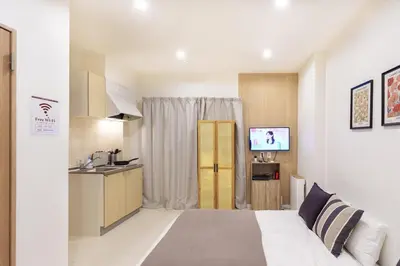 a hotel room with a bed and a kitchen at \u6953\u5c4b1F 120Ta in Tokyo
