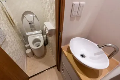 a bathroom with a sink and a toilet at Y's INN Ikebukuro 013T in Tokyo