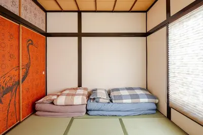 a small room with two beds in it at Y's INN Ikebukuro 013T in Tokyo