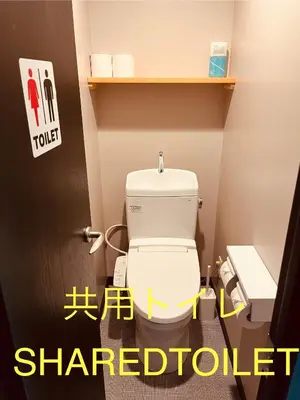 a bathroom with a white toilet in a room at Mikami Asakusabashi Hotel in Tokyo
