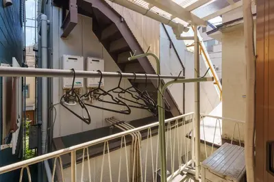a hallway of a building with a bunch of wires at \u5927\u718a\u306e\u5bb6 028t in Tokyo