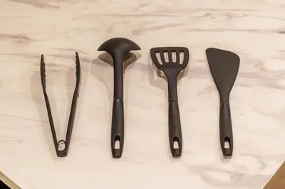 a group of utensils sitting on top of a counter at MINE HOME\u91ce\u65b9 121t in Tokyo