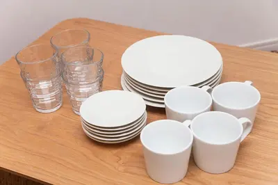 a group of plates and glasses on a table at \u697d\u5bbfSUMIDA 002t in Tokyo