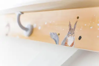 a wooden drawer with a bird and bees on it at \u697d\u5bbfSUMIDA 002t in Tokyo