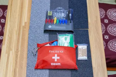 a first aid kit and a bag of pens and pencils at Y's INN 押上 115T in Tokyo