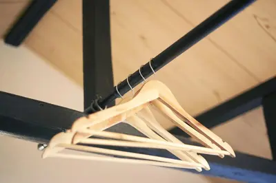a white hanger hanging from a ceiling at \u5922\u306e\u5929\u7a7a\u6a39 027t in Tokyo