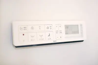 a white microwave hanging on a white wall at \u5922\u306e\u5929\u7a7a\u6a39 027t in Tokyo